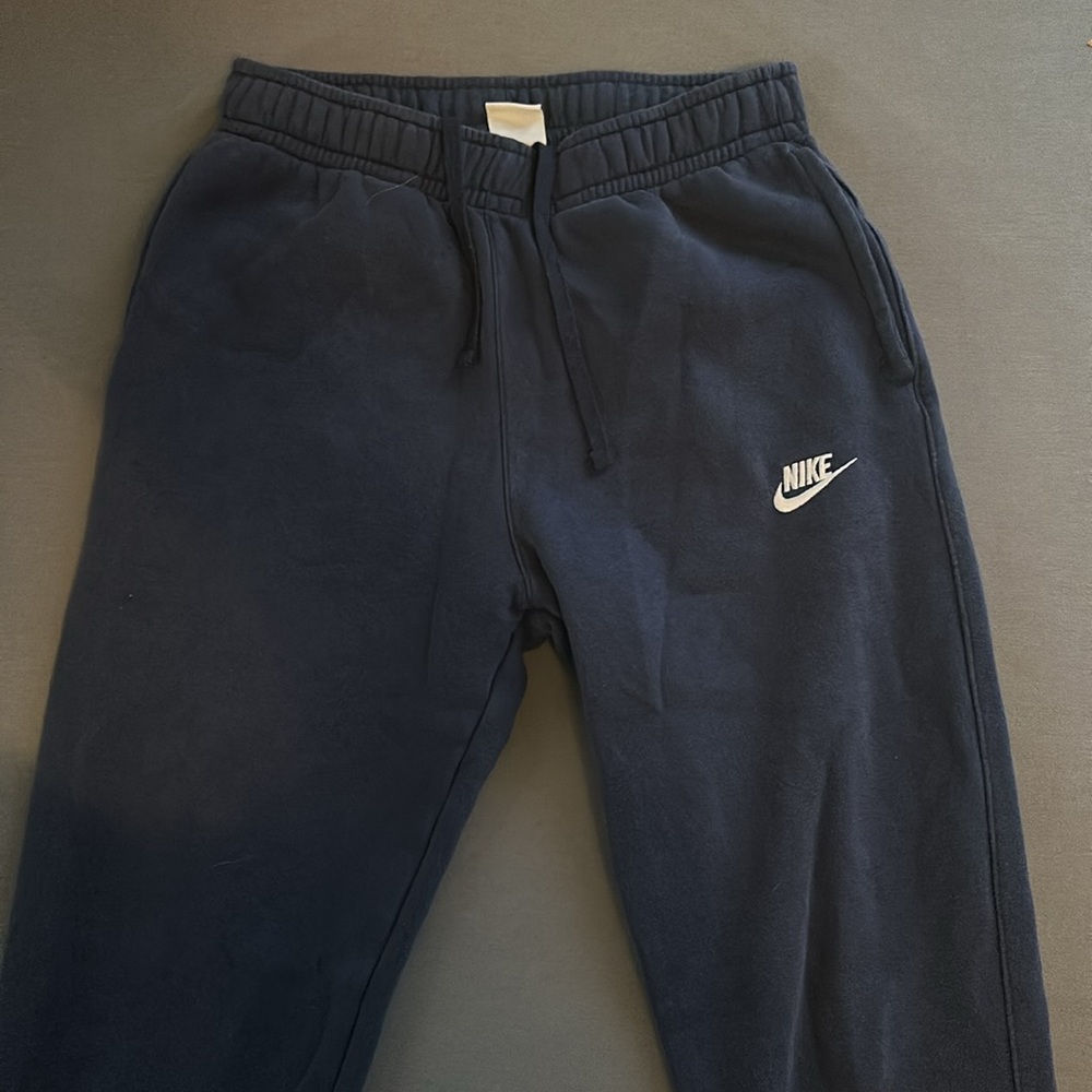 Dark blue Nike sweatpants, size small.